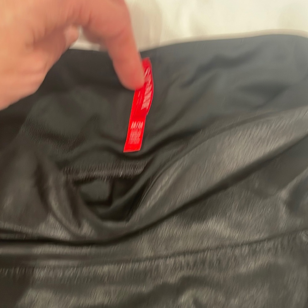 Black shiny Spanx leggings. Great condition.